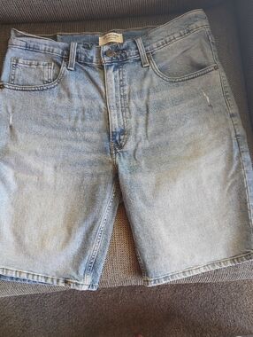 Levi's Faded and Distressed Bermuda Denim Shorts